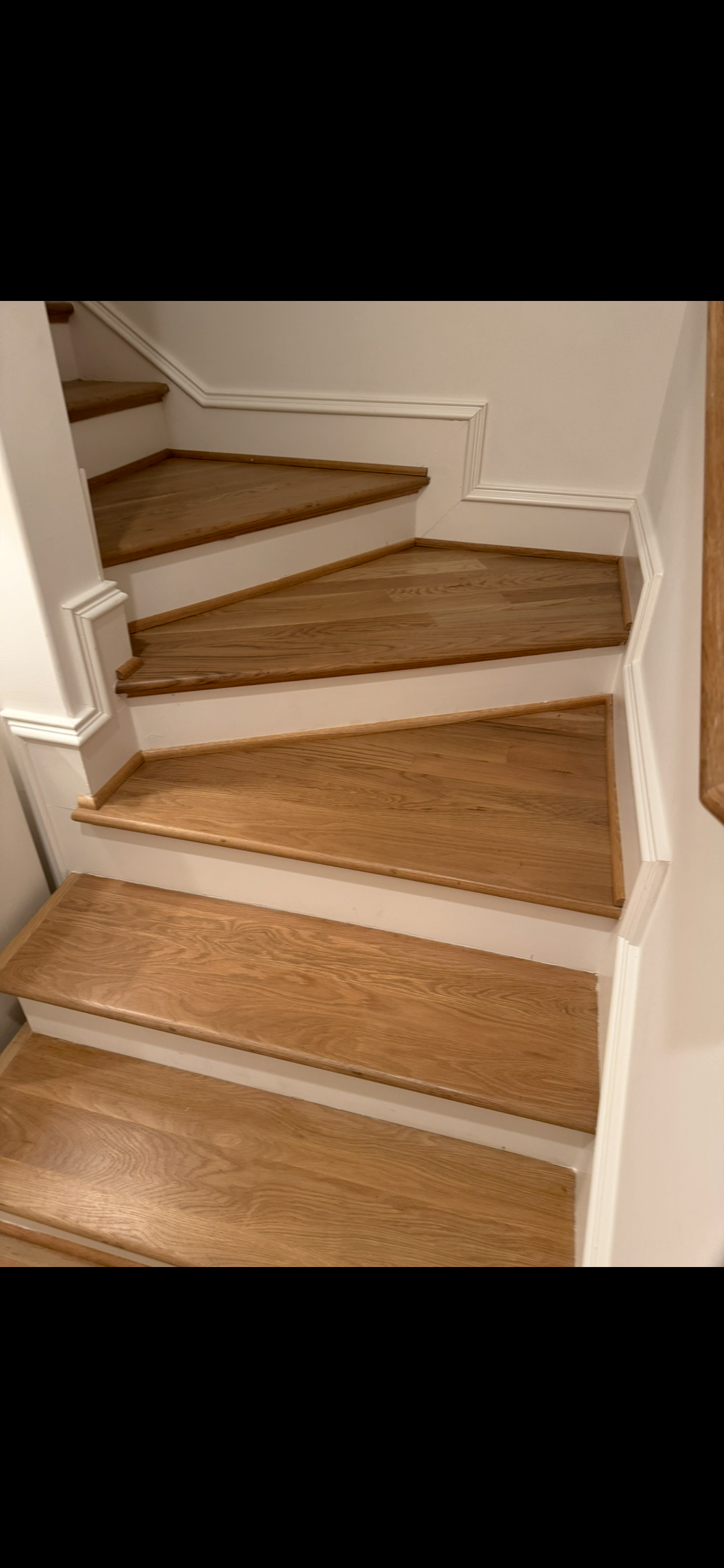 Bare hardwood staircase before custom stair runner installation by Underfoot Design - project 1