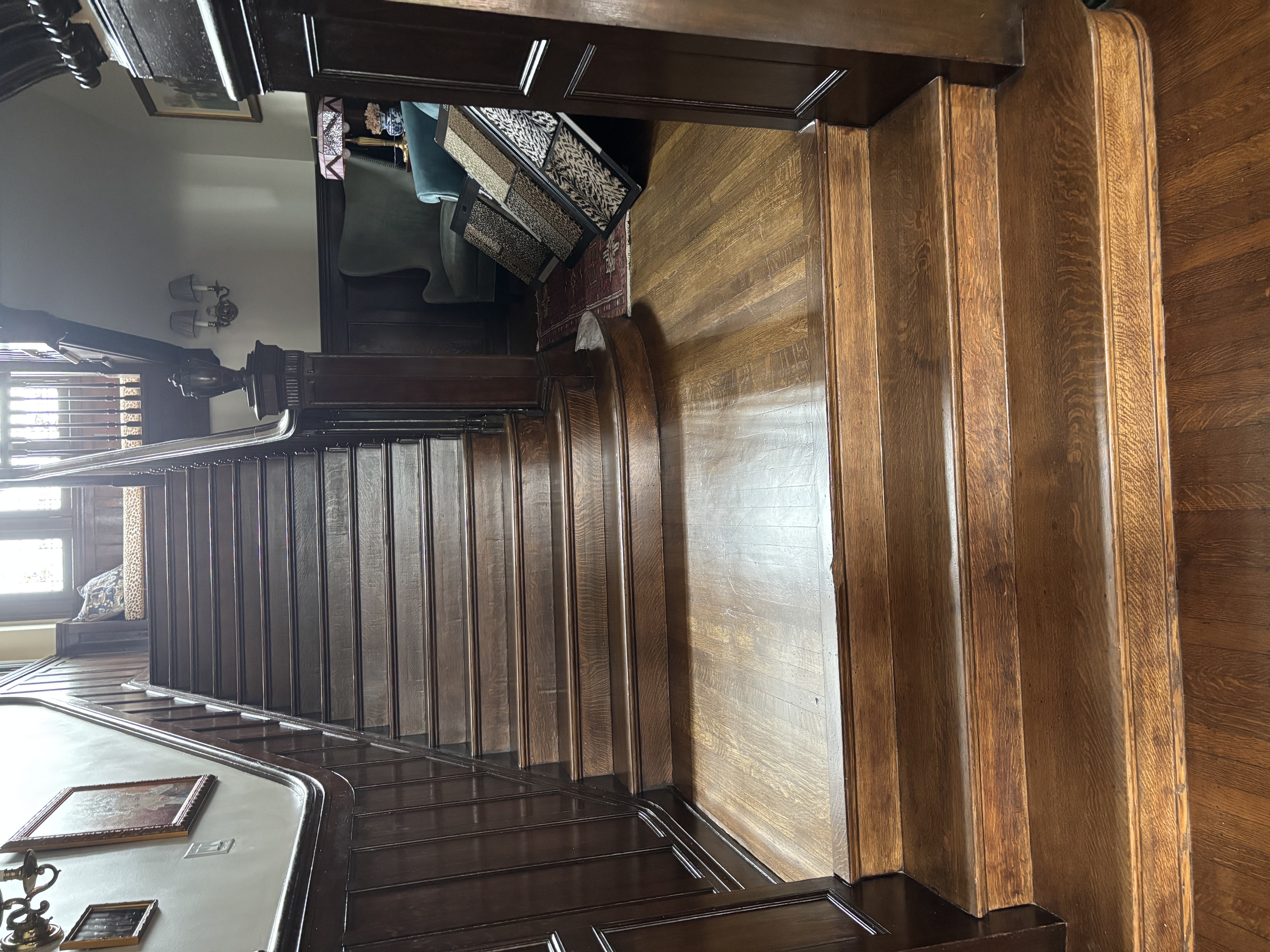 Dark quarter-sawn oak hardwood staircase and landing