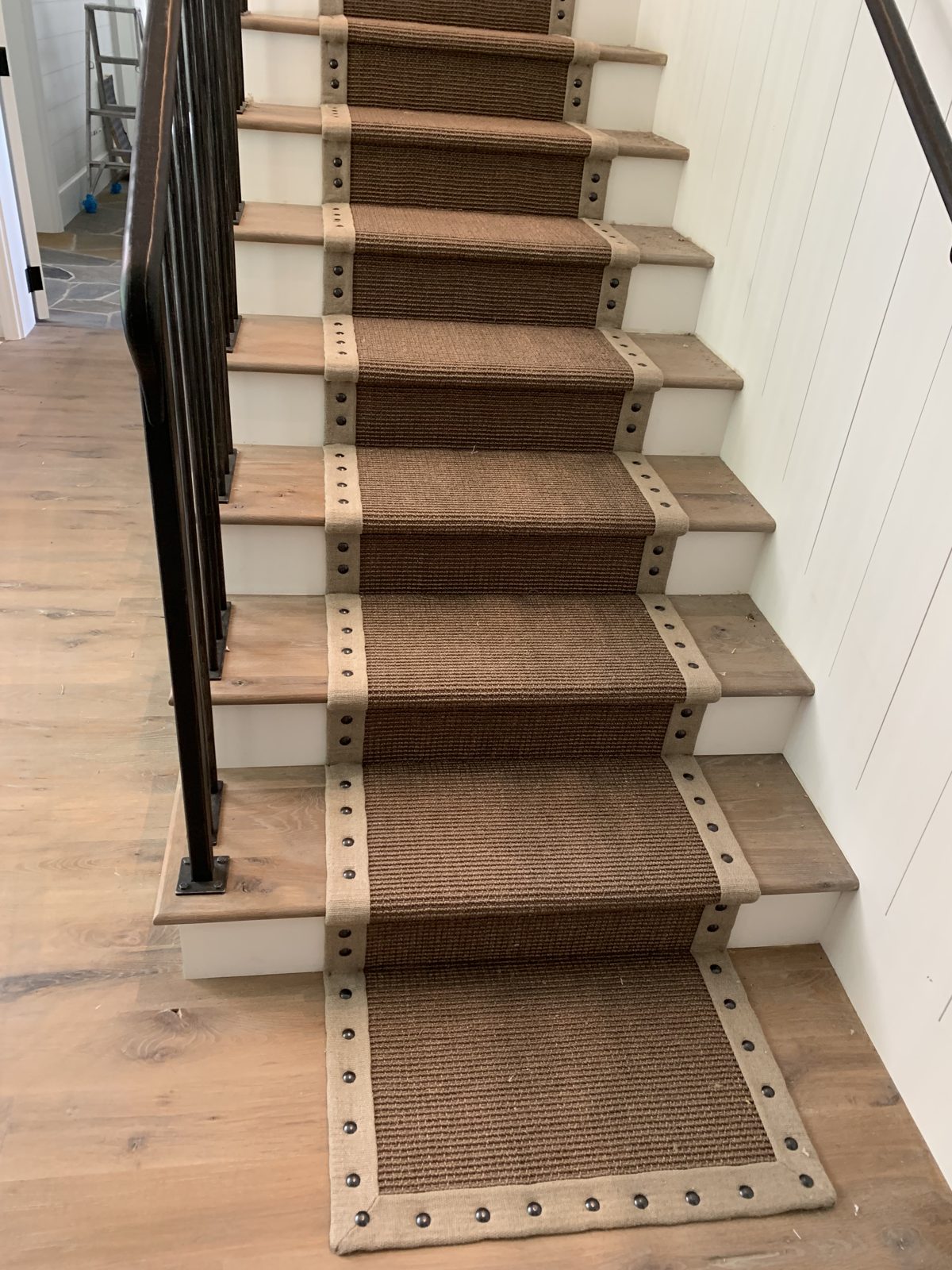 Sisal stair runner with leather border and nailhead trim