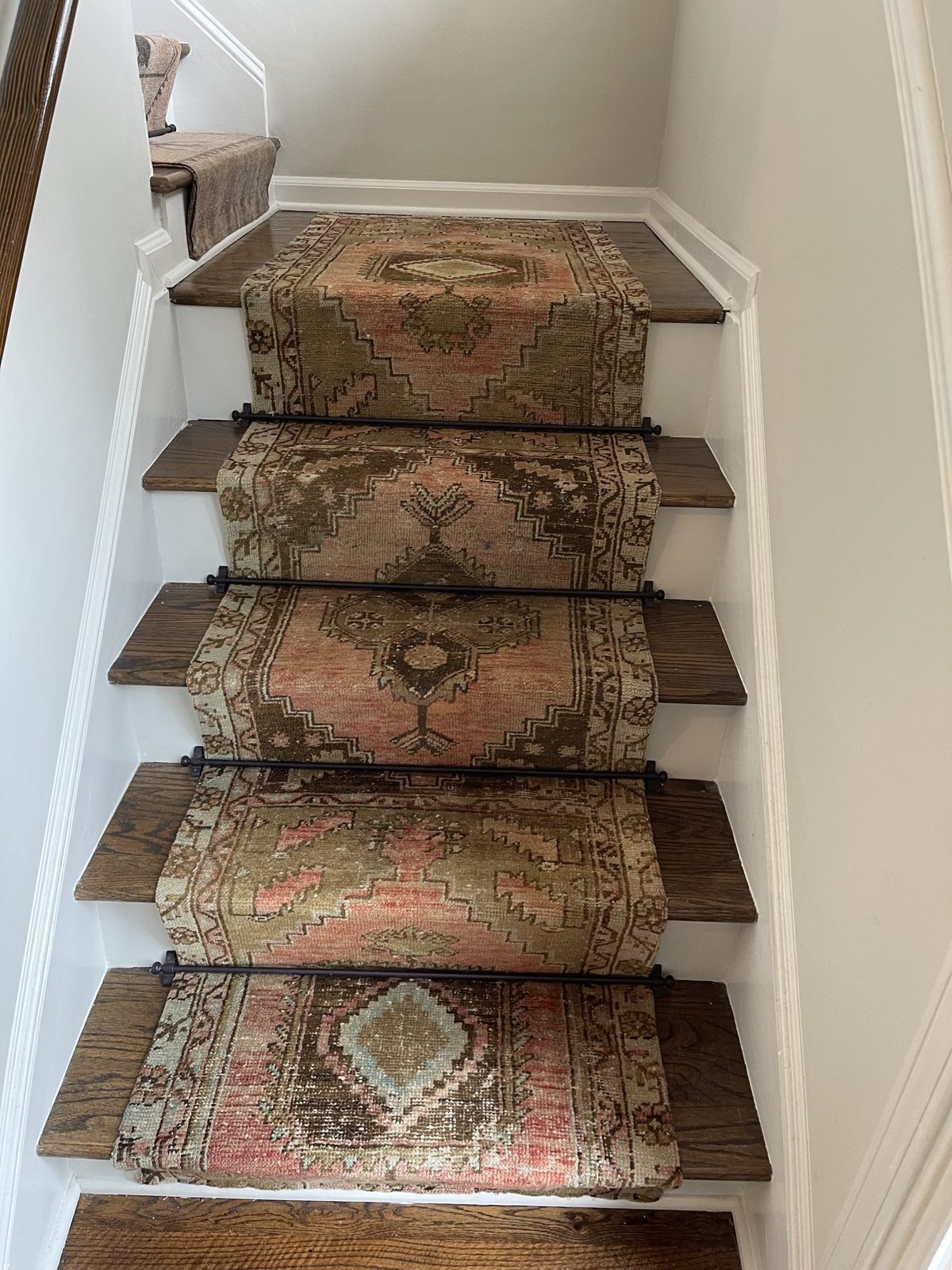 Ornate Persian-style patterned stair runner