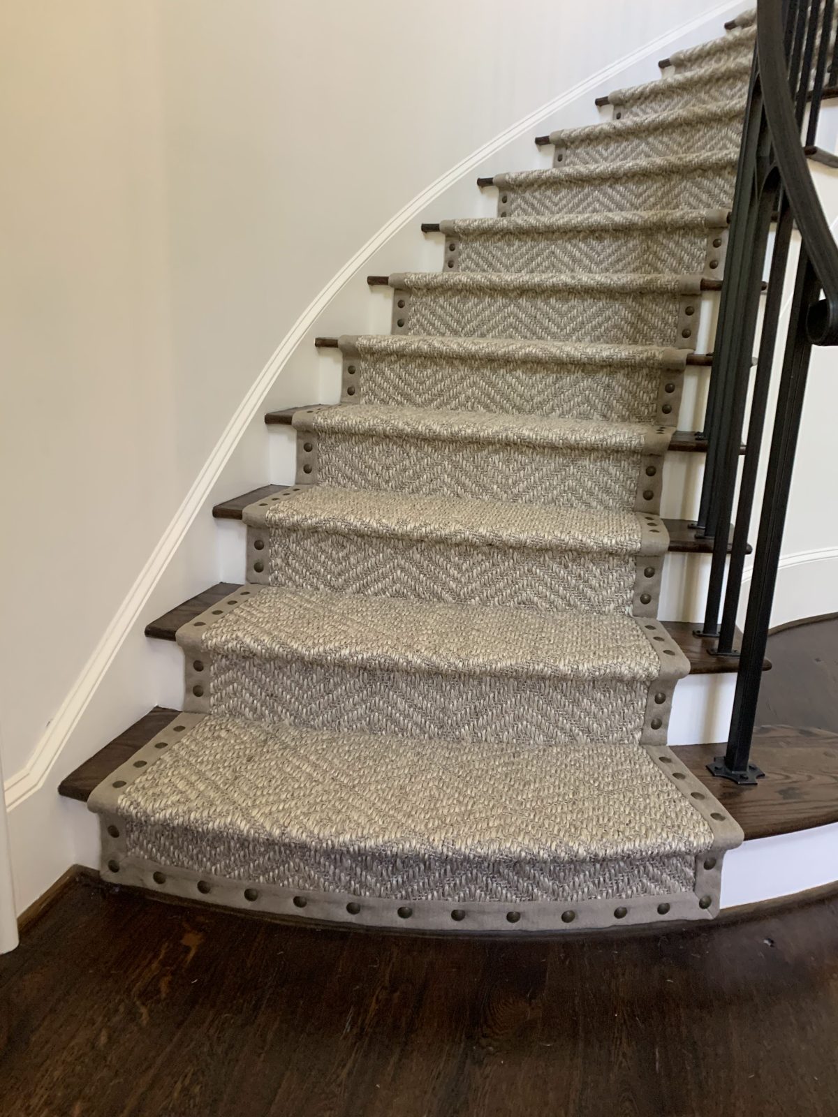 Antelope-print stair runner on a straight staircase