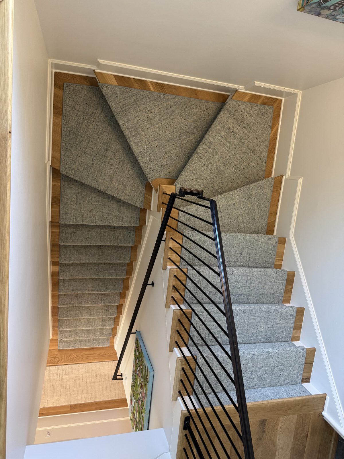 Sisal stair runner on a multi-flight staircase from above